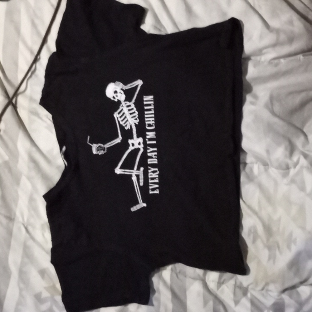 Black stylish crop top with cute saying and an adorable skeleton relaxing